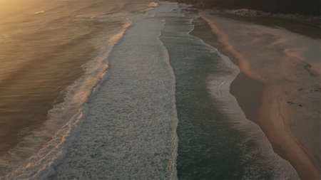 sunset, background, nature, sun, sky, good, nature, sea, blue sea, stars on the sky, white waves, White clouds, background clouds, sunset yellow, starfall, orange sunset, city in theの写真素材