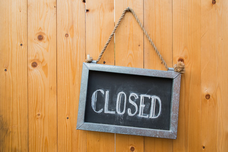 Closed Sign Hang On Wood Doorの写真素材