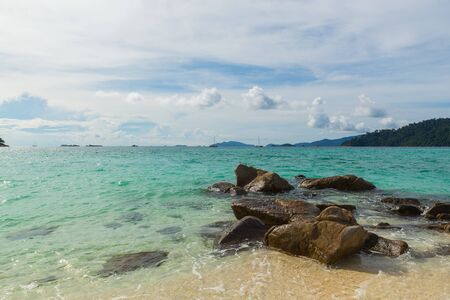 Sunrise beach with blue cloud sky in Koh Lipe islandの写真素材