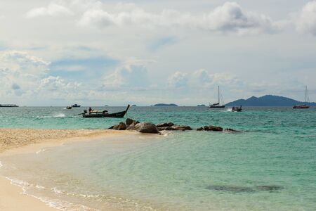 Sunrise beach with blue cloud sky in Koh Lipe islandの写真素材