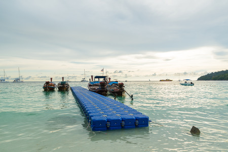 Koh Lipe,Thailand - November 28,2014 : Long tail boats lined along the beach in Koh Lipe island in Thailandのeditorial素材