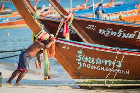 Koh Lipe,Thailand - November 29,2014 :  Unidentified villager prepare boat for launch tourist around Lipe islandのeditorial素材