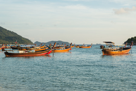 Long tail boats with sunrise sky in Koh Lipe Islandのeditorial素材