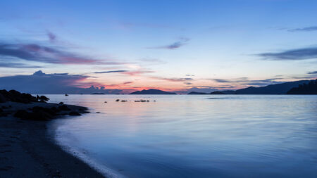 Beautiful silhouette sunset at beach on Lipe island, Thailand.の写真素材