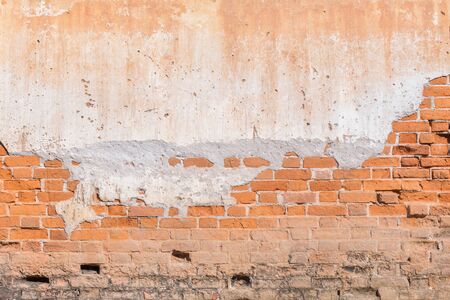 cracked concrete brick wall backgroundの写真素材