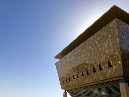 Masdar City, Abu Dhabi, UAE - April, 2019. The city is designed in sustainable and smart way that protects the buildings from the direct sun rays. Buildings are equipped with solar panels on the roofsのeditorial素材