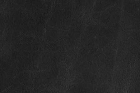 A background texture of black stone colored leatherの写真素材