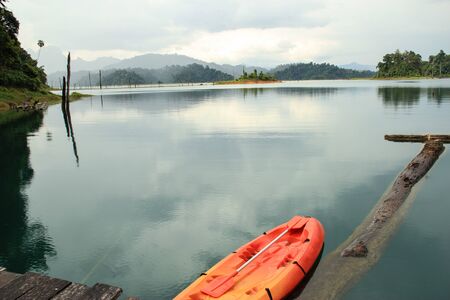 Floating house on the lake and  kayak Scene after rain at Khao Sok SuratthaniThailandの写真素材