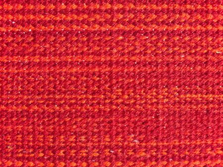 Red woven textile backgroundの写真素材