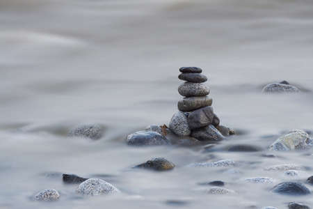 Stack of pebble stones. Concept zen, spa, summer, relax.