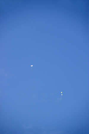 Balloon flying in the skyの写真素材