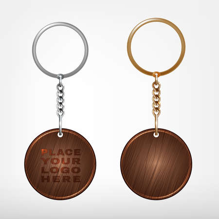 Illustration of a wooden and metal oval key chain with a ring isolated on a white backgroundのイラスト素材