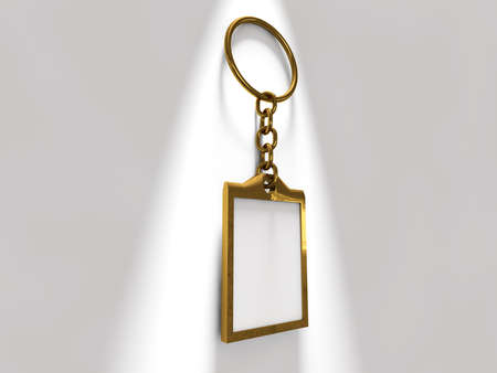 Blank gold keychain with a ring for a key. Ideal template for branding, identity guidelines and...