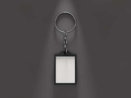 Blank metal keychain with a ring for a key. Ideal template for branding, identity guidelines and...