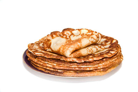 pile of russain pancakes on the blue plate の写真素材