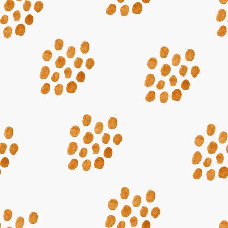 Abstract seamless pattern with golden polka dots on a white background. Hand painted gouache wallpaper.の写真素材