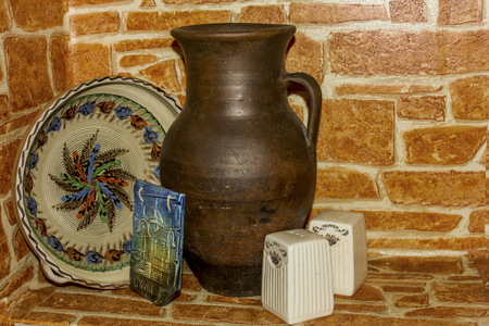 Still Life from a jug, plates that are in the nicheの写真素材
