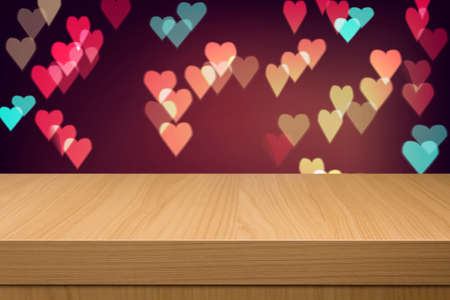 Holiday background with empty wooden table and heart bokeh lights. Valentine's Day Background with Hearts. Love concept.  Ready for product montage displayの写真素材
