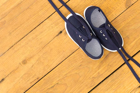 Shoes. Blue shoes on wooden floor