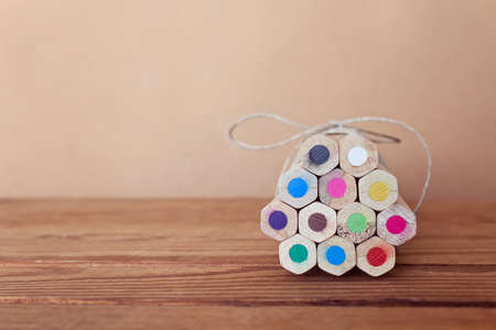Colored pencils. Colored pencils tied in a heap