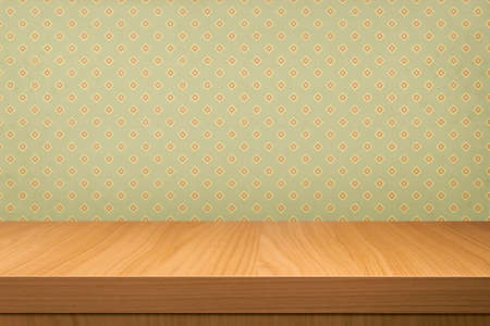 Empty  wooden table over vintage wallpaper. Ready for product montage display