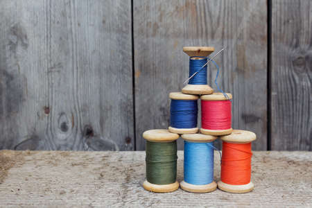 Vintage reels of thread  and needle. Sewing tools