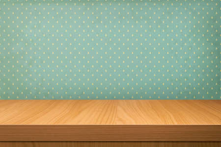 Empty wooden table over vintage wallpaper with a pattern of raindrops. Autumn theme. Ready for product montage displayの写真素材