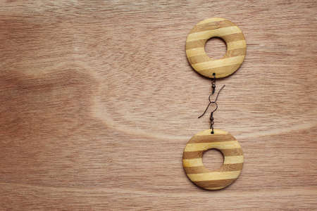 Wooden earrings. Hipster lifestyle.の写真素材