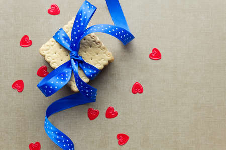 Cookies with blue ribbon. Cookie gift  for valentines or mothers day. Top viewの写真素材