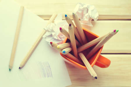 Top view of colorful pencils in a cup. Toned imageの写真素材