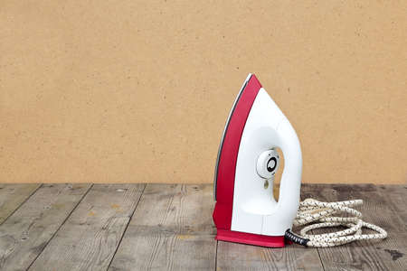 Retro Iron on rusty vintage backgroundの写真素材