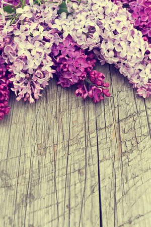 The beautiful lilac on a wooden backgroundの写真素材