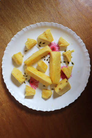 Ripe pineapple slices top view