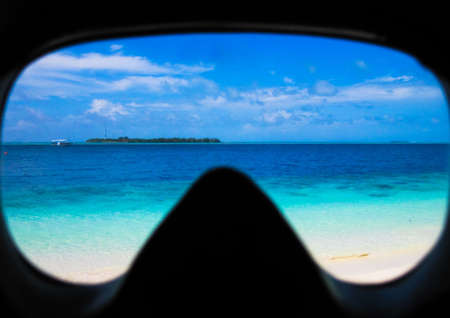 View through a diving maks on paradiseの写真素材