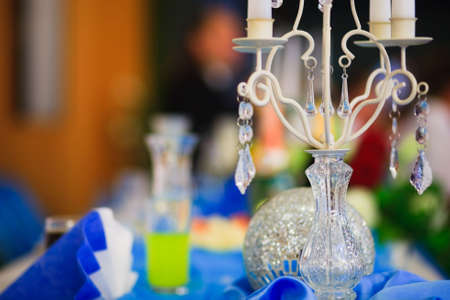 Wedding table set with glasses and small wrapped presentの写真素材