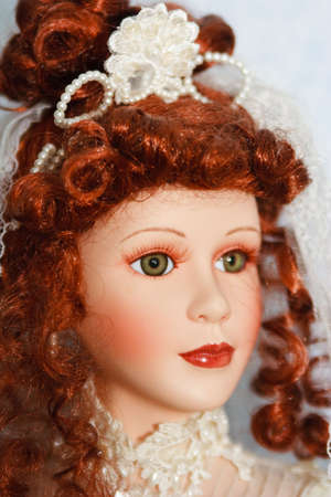 A close up of a young innocent doll faceの写真素材