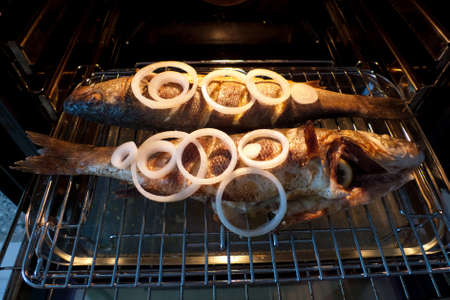 Photo of two grilled fishes ready to eatingの写真素材
