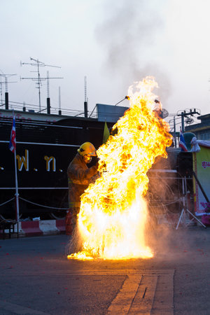 Firefighters extinguishing drills のeditorial素材