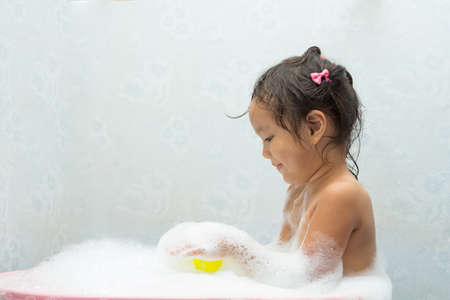 Children play in the water  Children play in the water bubble の写真素材