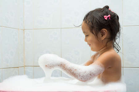 Children play in the water  Children play in the water bubble の写真素材