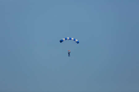 parachute./Under the clouds.の写真素材