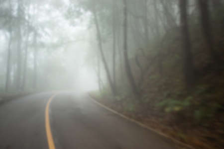 Foggy  road on the mountain blur.