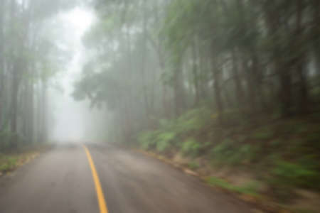 Foggy  road on the mountain blur.