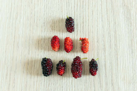 Mulberry on the wooden floorの写真素材