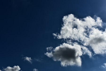 white clouds with bright sky