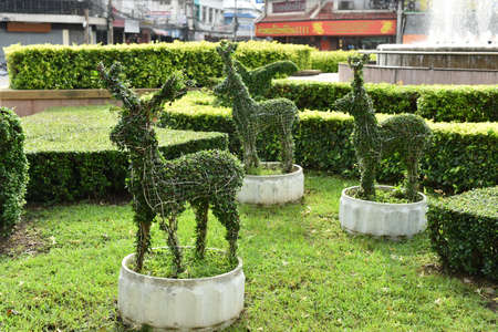 Fake deer made from grass to decorate the garden.の写真素材