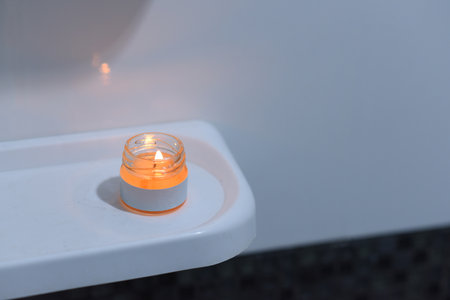 lighted candles in the bathroomの写真素材