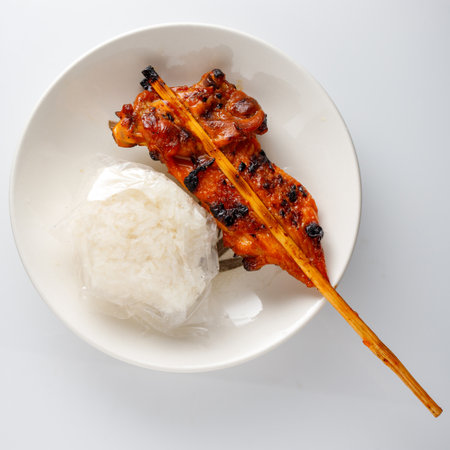 Grilled Chicken Skewers with Sticky Rice.の写真素材