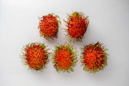 The rambutan is not beautiful on the white background.