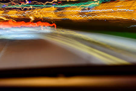 blurred light lines at nightの写真素材